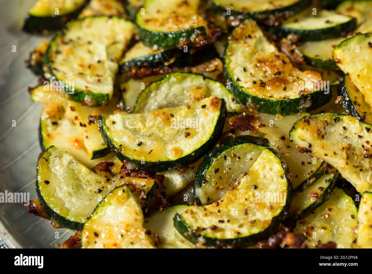 Homemade Oven Roasted Zucchini Slices with Garlic and Pepper Stock