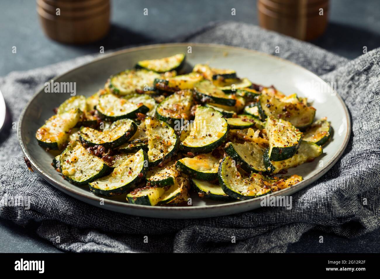 Homemade Oven Roasted Zucchini Slices with Garlic and Pepper Stock