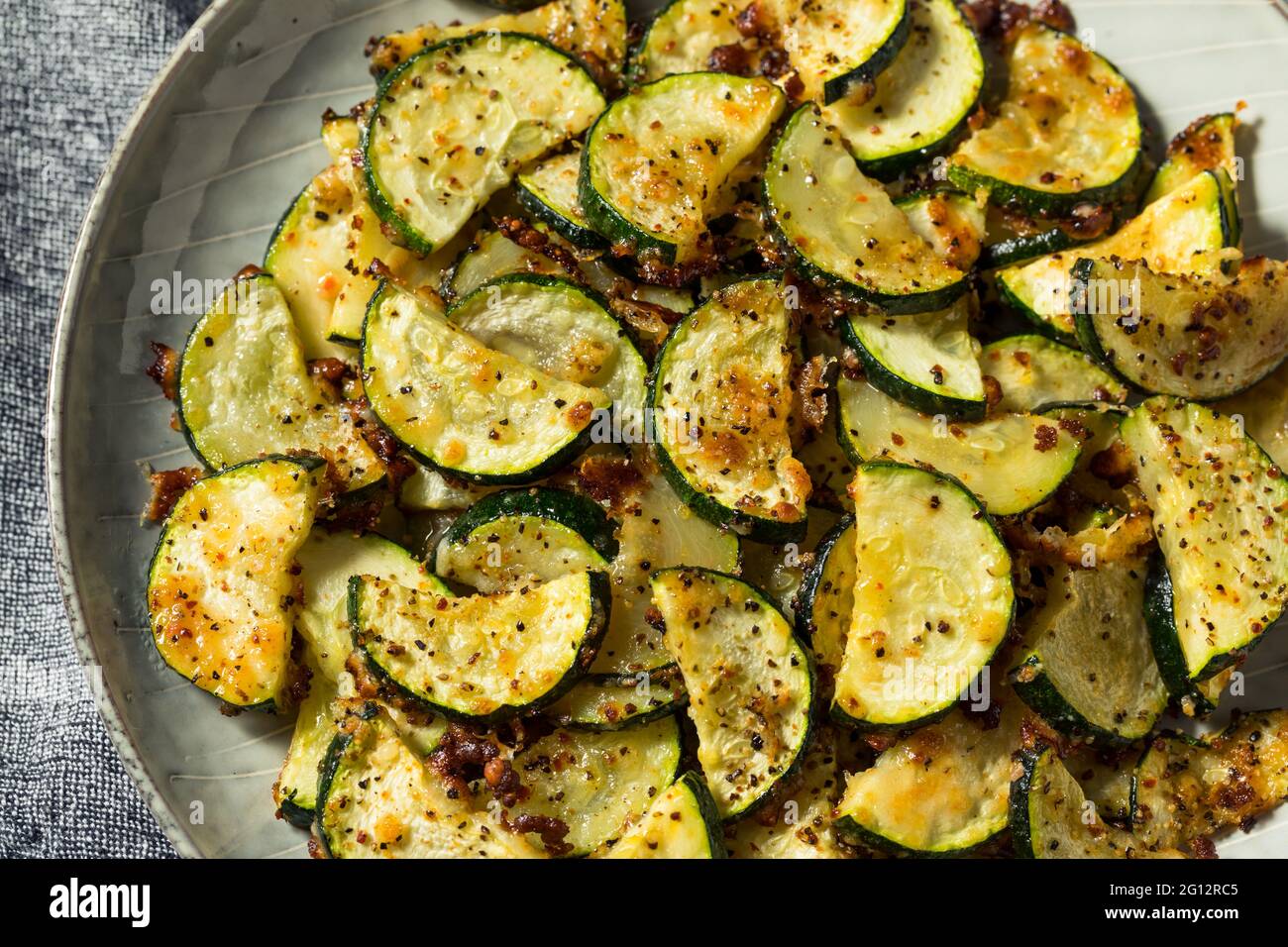 Homemade Oven Roasted Zucchini Slices with Garlic and Pepper Stock