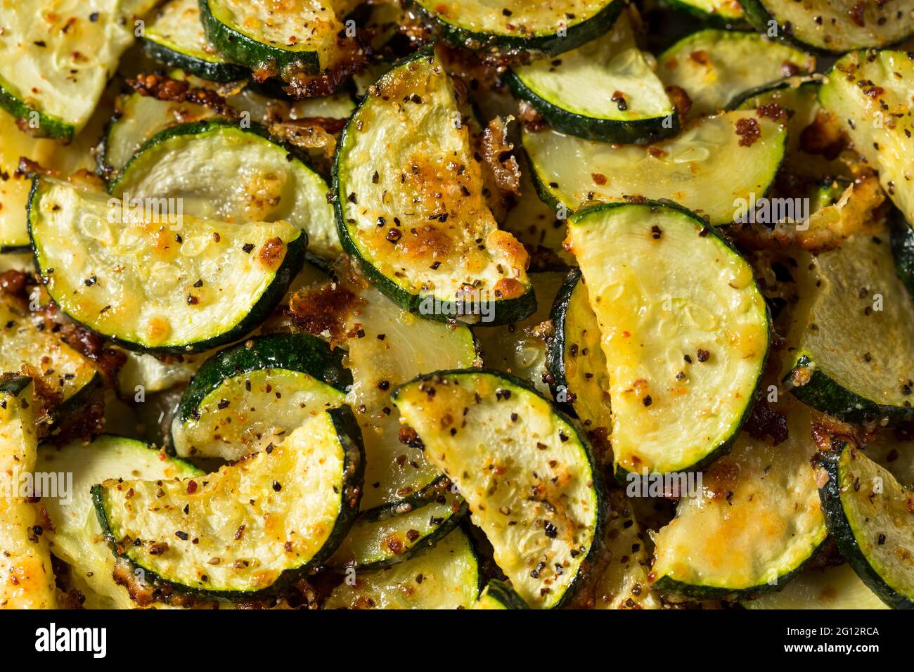 Homemade Oven Roasted Zucchini Slices with Garlic and Pepper Stock