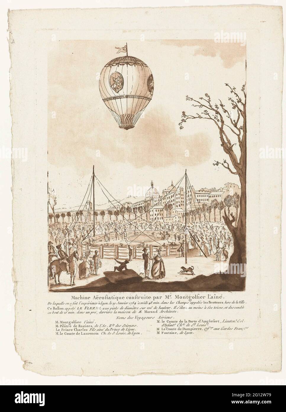 The hot air balloon, Le Flezel, from Mr. Montgolfier l'Aîné; Machine aerostatique construite par. Montgolfier l'Aîné. On January 19, 1784, Joseph Montgolfier, on the banks of the Rhône, stepped into a balloon, along with physicist pilâtre de Rozier. The luchballon floats above a specially furnished grounds with spectators, outside the city of Lyon, in the evening Montgolfier will be honored in the Opera of Lyon. Stock Photo