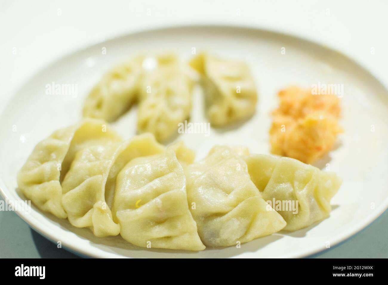 Momo , type of South Asian dumpling; native to Tibet, Nepal, Bhutan and