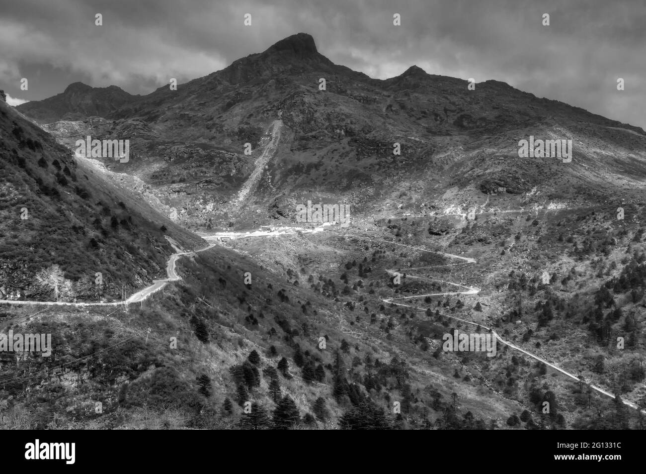Beautiful famous curvy roads on Old Silk Route, Silk trading route between China and India, Sikkim - black and white image Stock Photo