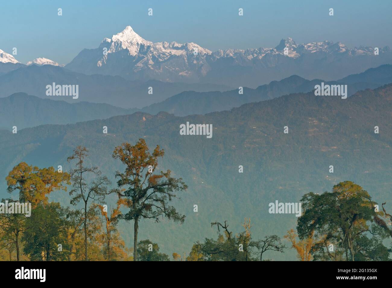 Beautiful view of Silerygaon Village with Kanchenjunga mountain range at the background, moring light, at Sikkim, India Stock Photo