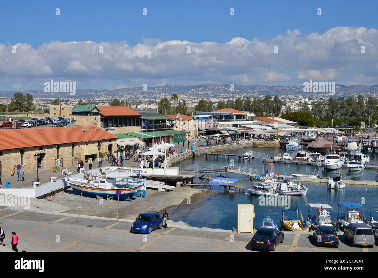 PAPHOS, SOUTHERN CYPRUS, JULY 2016  the harbor on a busy summer day with many people and boats and much holiday activity. Stock Photo