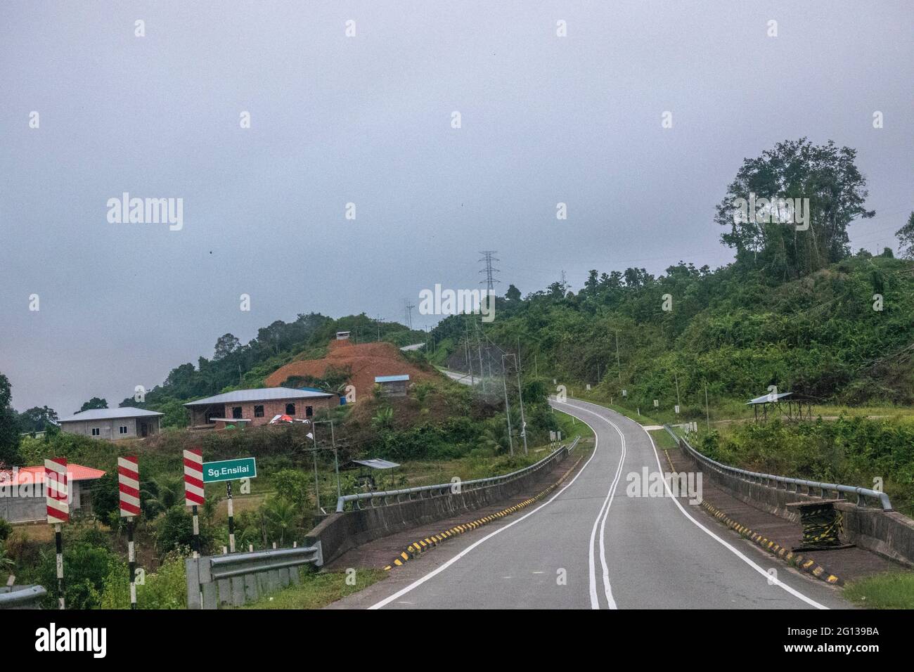 Morning mist at Kapit-Song mountainous road, Sarawak, East Malaysia Stock Photo