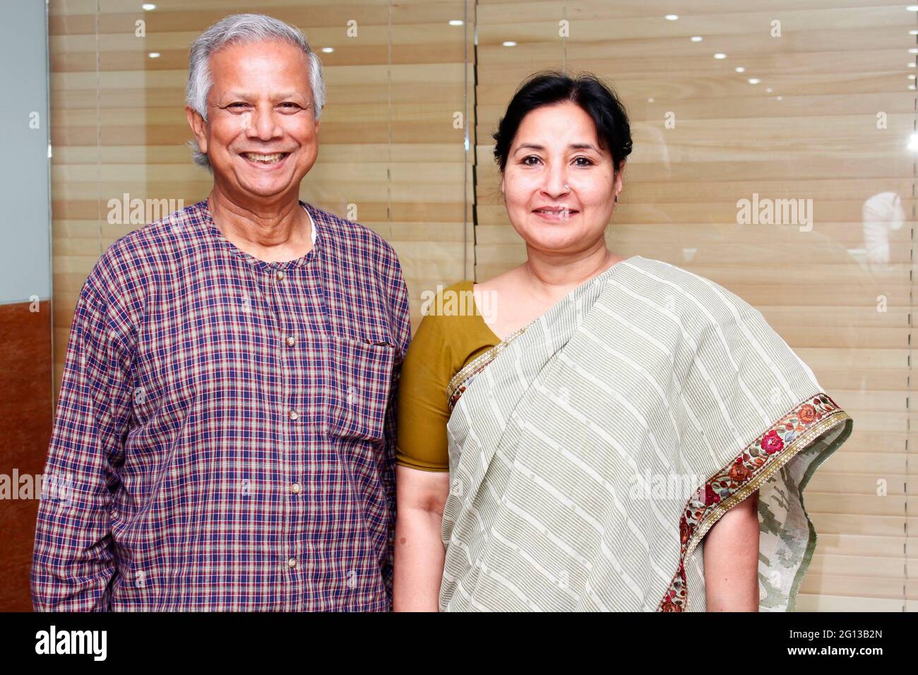 Bangladesh. “ September 20, 2012: Muhammad Yunus a popular economist with a colleague at Grameen centre, Dhaka. Stock Photo