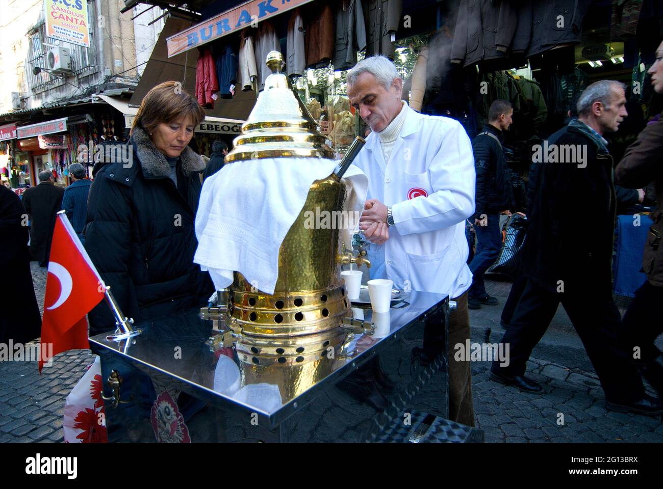 Traveling around Istanbul. Street tea vendor in Istanbul serving tea to