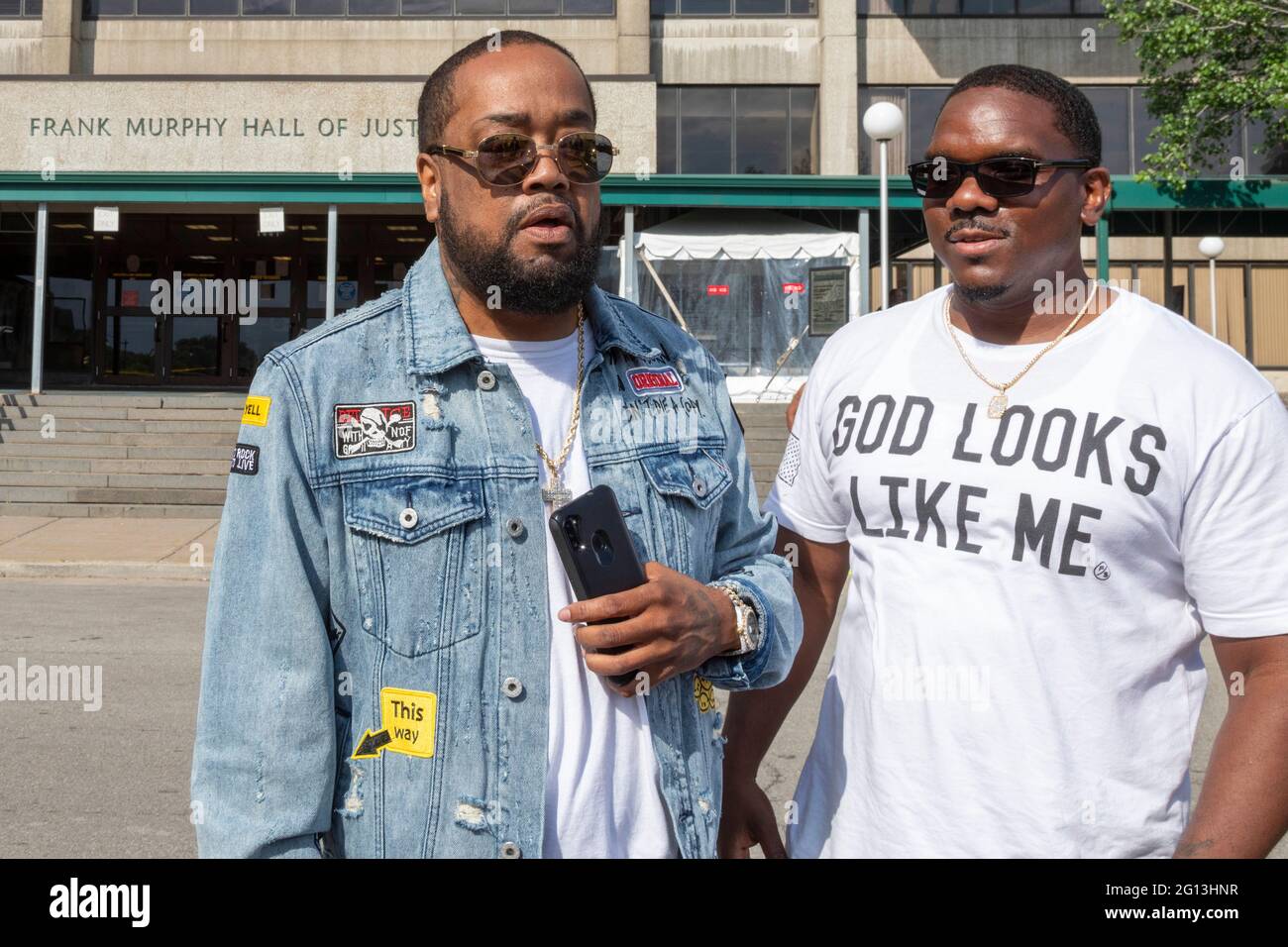 Detroit, Michigan, USA. 4th June, 2021. Family and friends of prisoners they say were wrongfully convicted rally outside the criminal courts building, the Frank Murphy Hall of Justice. George Clark (left) and Kevin Harrington spent nearly 18 years in prison before their murder convictions were overturned. Credit: Jim West/Alamy Live News Stock Photo
