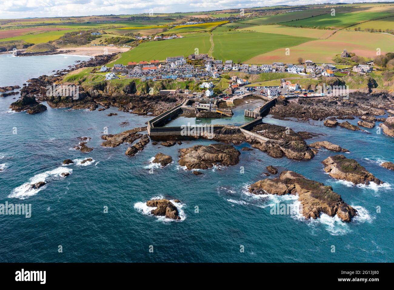 Aerial view of harbour at St Abbs in Scottish Borders, Scotland, UK Stock Photo