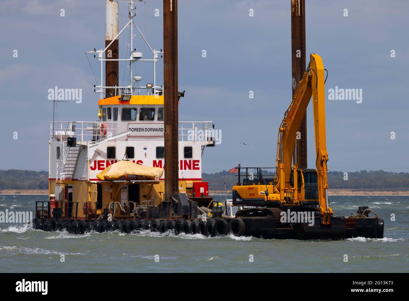 dredger,barge,JCB,long,arm,deep, The Solent, Cowes, isle of Wight, England, UK, Stock Photo