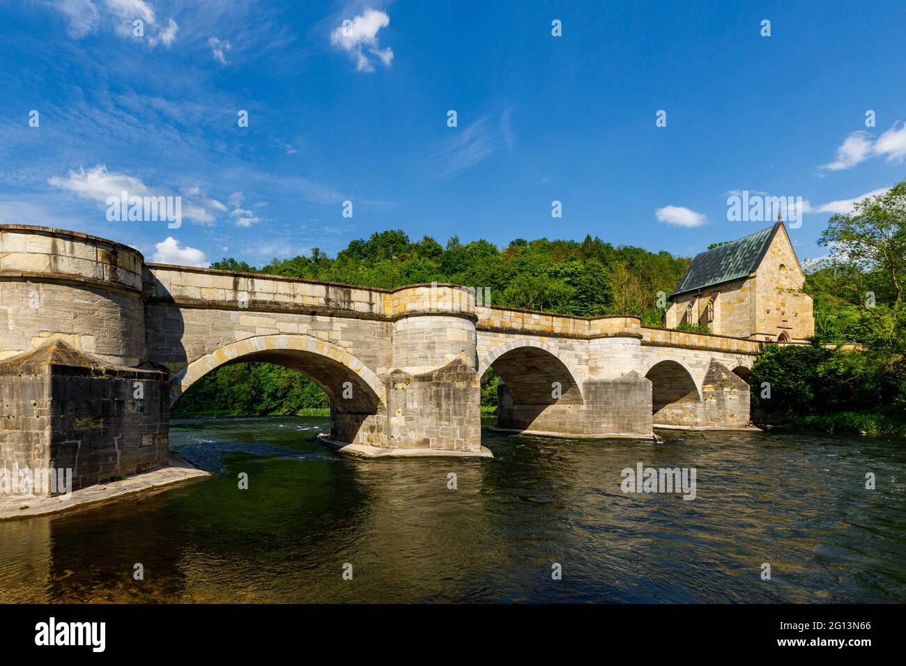 The historic bridge over the Werra River at Creuzburg in the Werra Valley in Thuringia Stock Photo