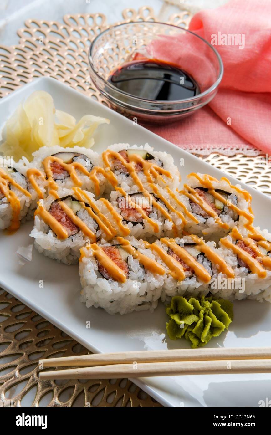 Japanese salmon sushi with spicy sriracha kewpie mayonnaise Stock Photo