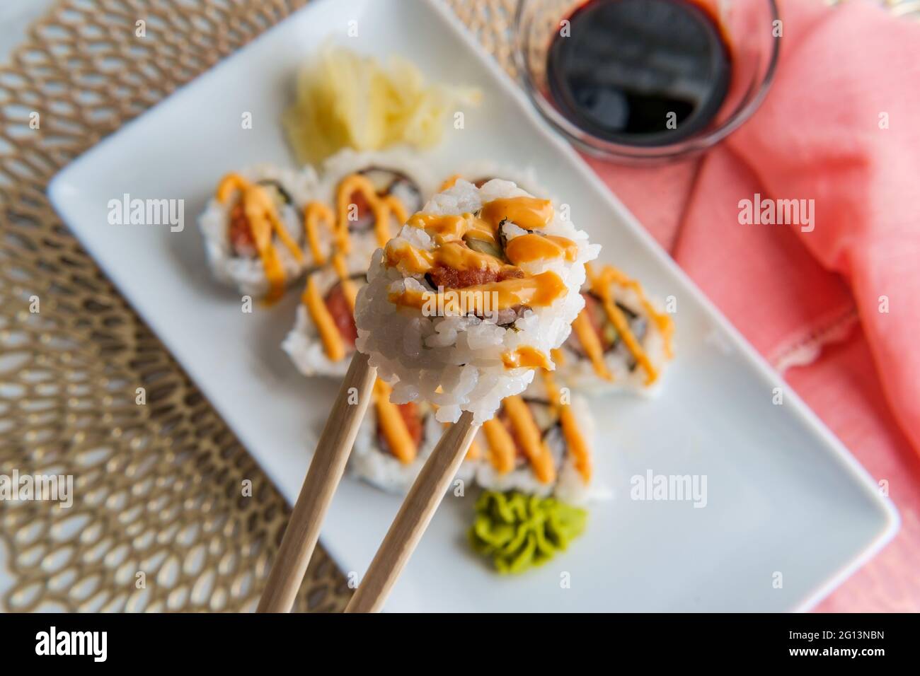 Japanese salmon sushi with spicy sriracha kewpie mayonnaise Stock Photo