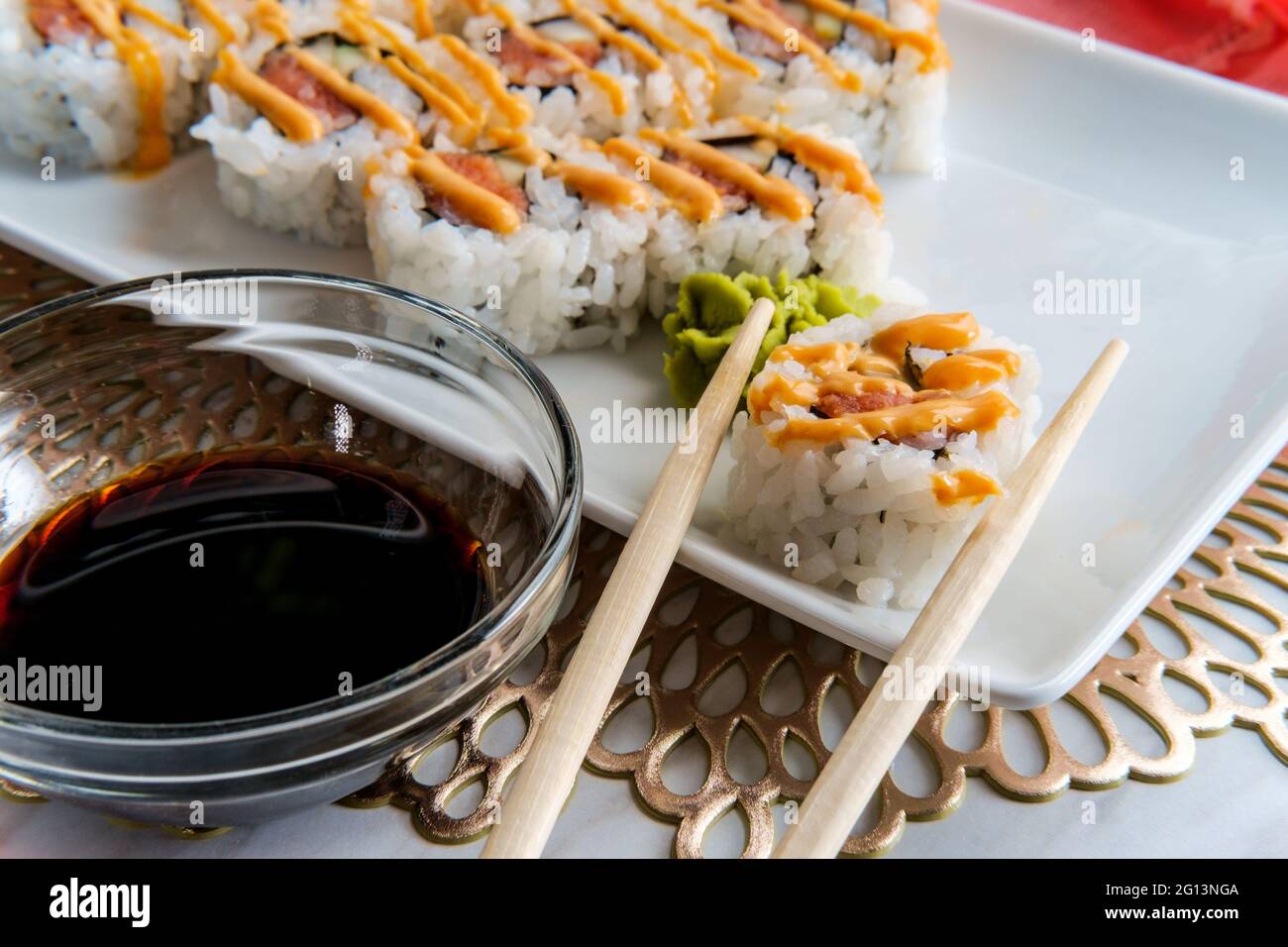 Japanese salmon sushi with spicy sriracha kewpie mayonnaise Stock Photo