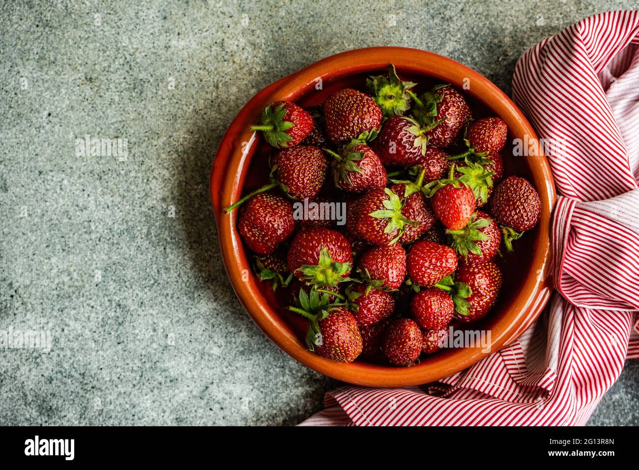 Summer background with ripe strawberries on concrete background Stock ...