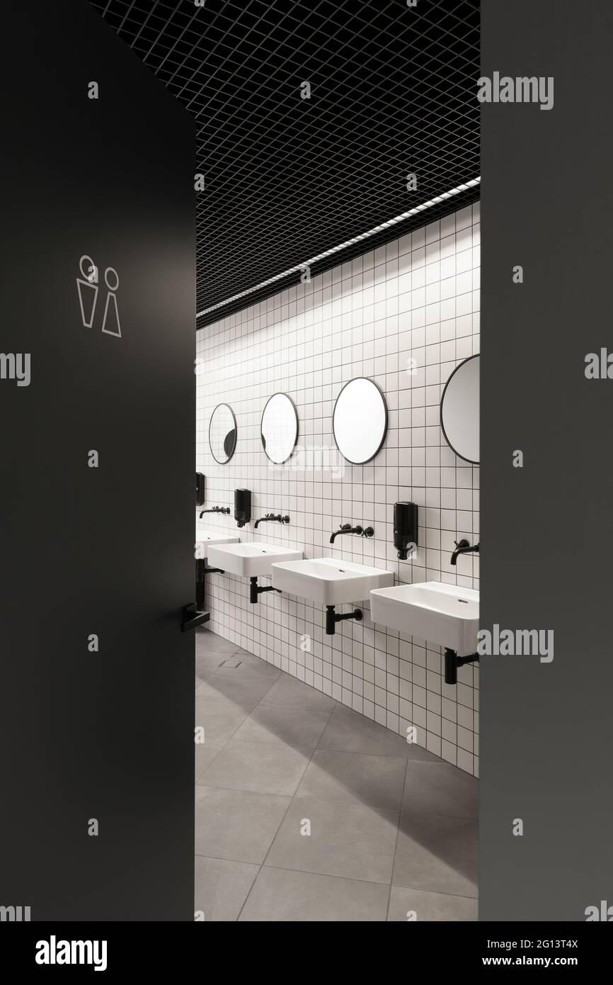 Modern public restroom minimal interior with metro style white tiles
