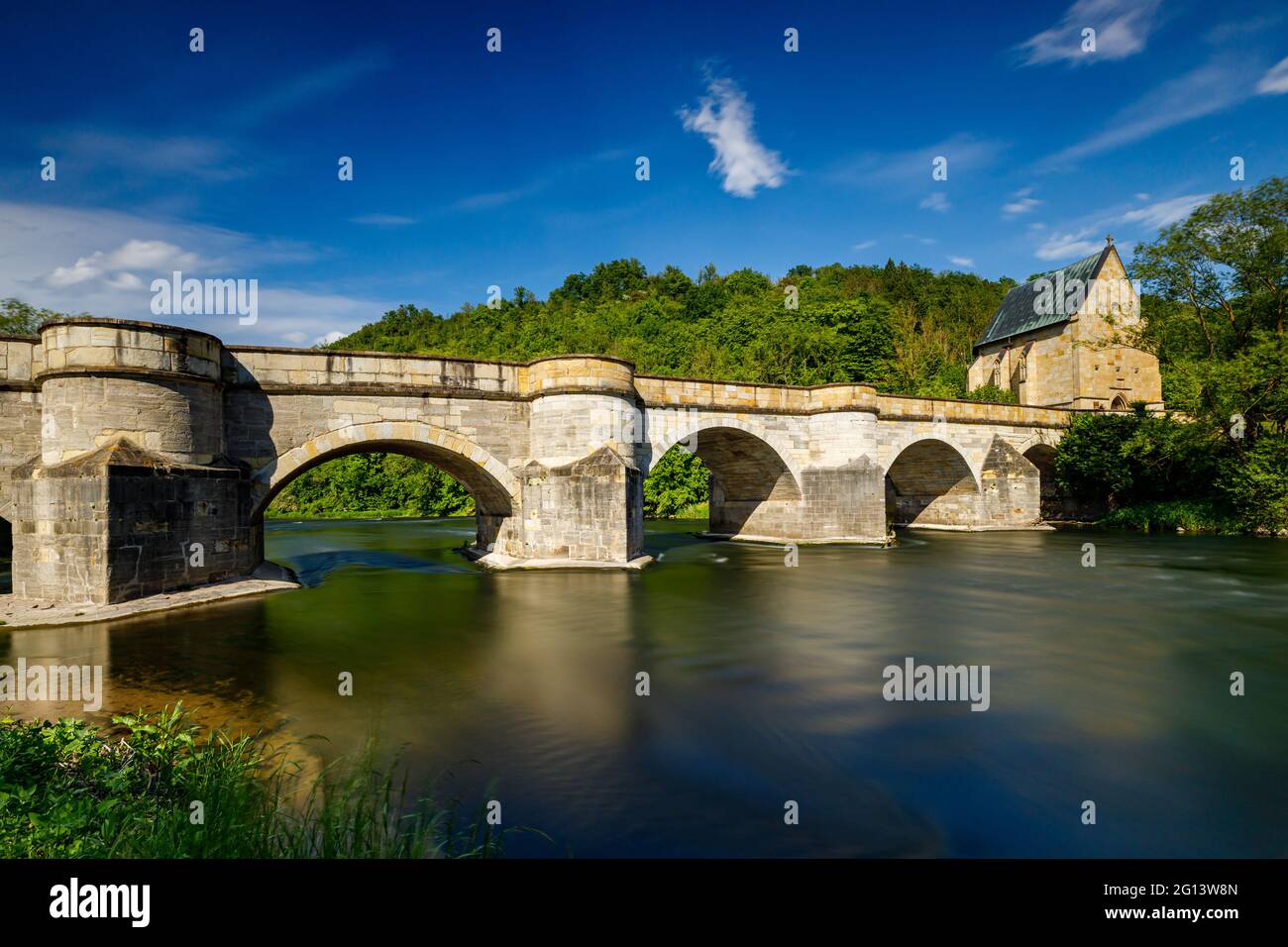 The historic bridge over the Werra River at Creuzburg in the Werra ...