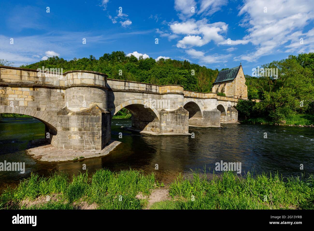 The historic bridge over the Werra River at Creuzburg in the Werra ...