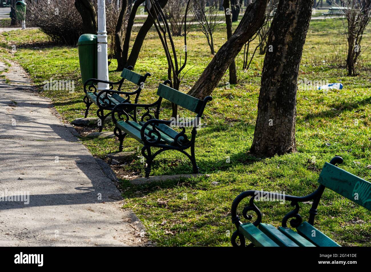 Empty benches in park in Bucharest, Romania, 2021 Stock Photo - Alamy
