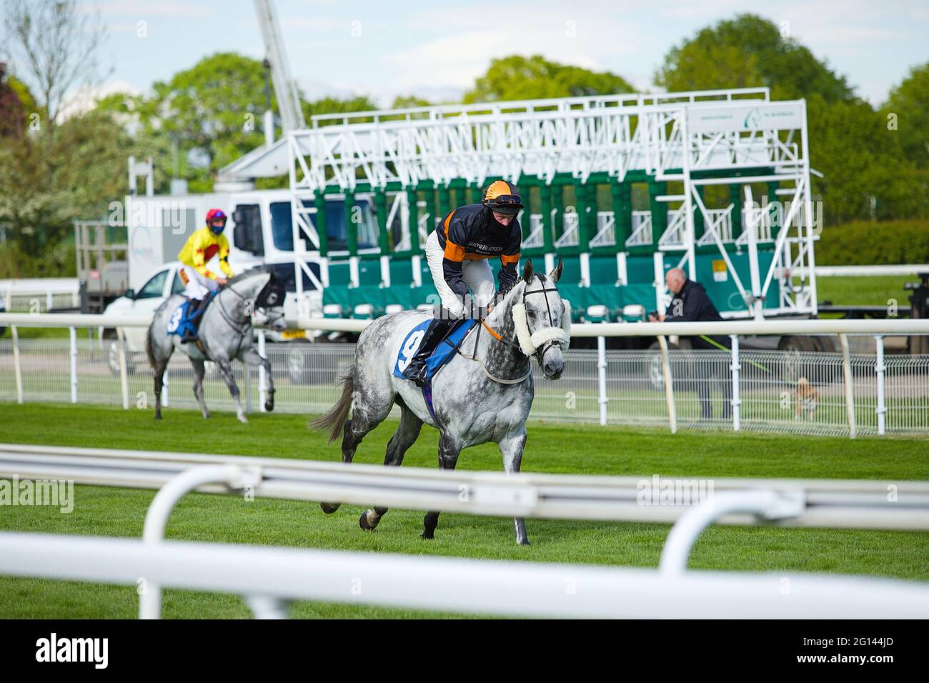 Matthew Ennis riding Markazi before the start of a race at York Racecourse. Stock Photo