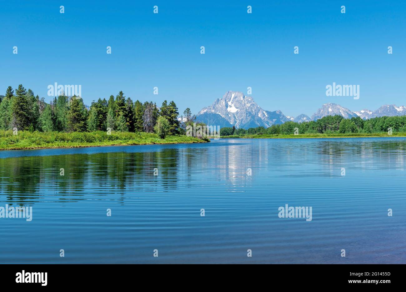 Grand Teton peaks by Snake River in summer by Oxbow Bend, Grand Teton national park, Wyoming, USA. Stock Photo