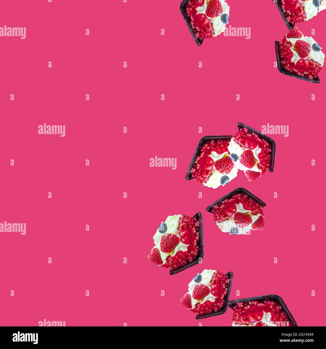 cakes fall from top to bottom on the right on the pink.Summer sweet flat flay  Stock Photo