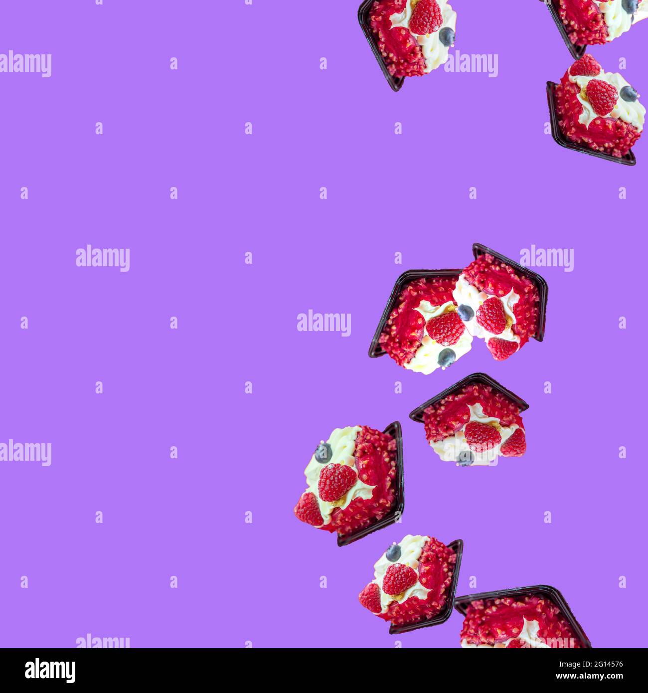 cakes fall from top to bottom on the blue-purple background on the right. Stock Photo