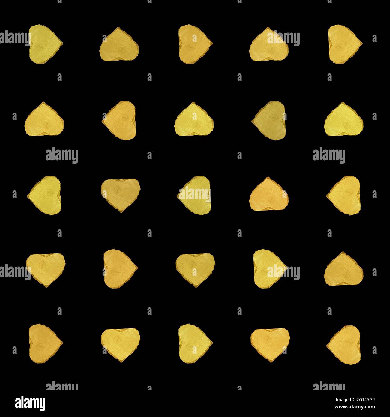 seamless pattern of yellow hearts, black background with chocolate in a yellow  Stock Photo