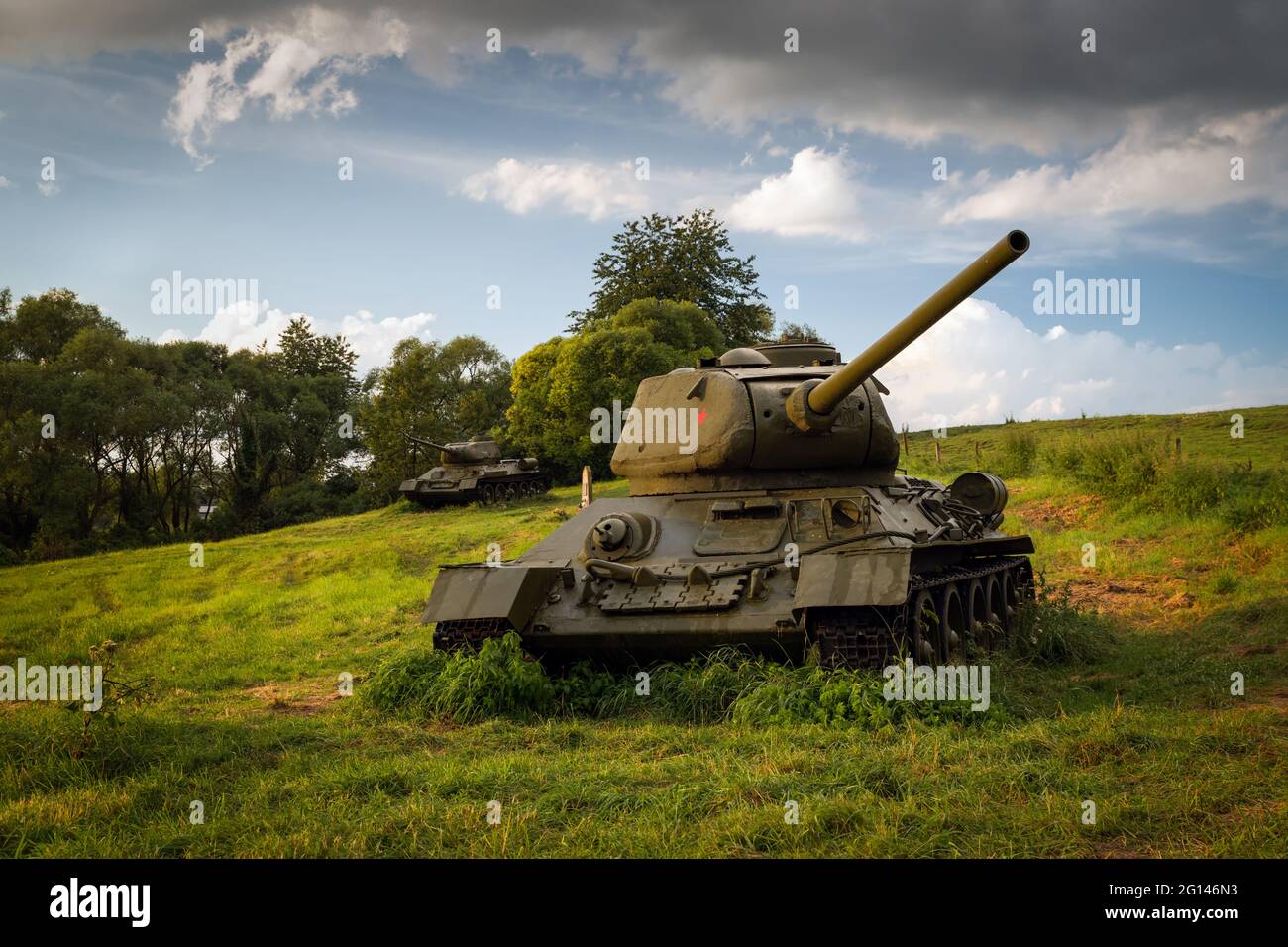 Soviet medium tank T-34 85 in the Valley of Death (Udolie smrti) - WWII battle area (the Battle of the Dukla Pass). Slovakia - Svidnik region. Stock Photo