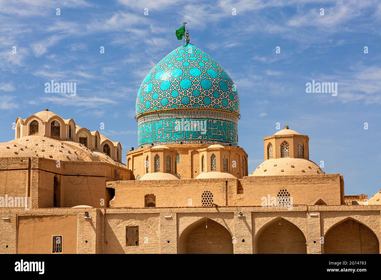 Mosque of  Shah Nematollah Vali Shrine with its green dome in the city of Mahan, Iran Stock Photo