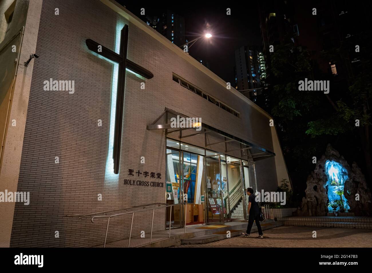 Hong Kong, China. 04th June, 2021. A man entering a church in Sai Wan Ho that held a memorial mass during the anniversary.Police blocked off Hong Kong Victoria Park to prevent people gathering to commemorate the 32nd anniversary of China's 1989 Tiananmen Square crackdown and arrested the organisers. Credit: SOPA Images Limited/Alamy Live News Stock Photo