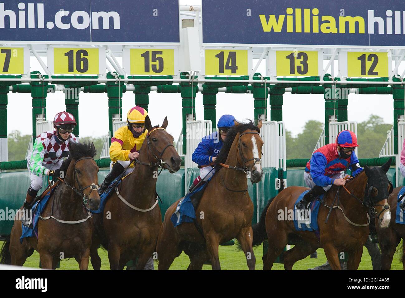 Jockeys Burst Out Of The Starting Gate At The Start Of A Race At York Racecourse Featuring Sean Kirrane Nathan Evans Cieren Fallon And Rowan Scott Stock Photo Alamy