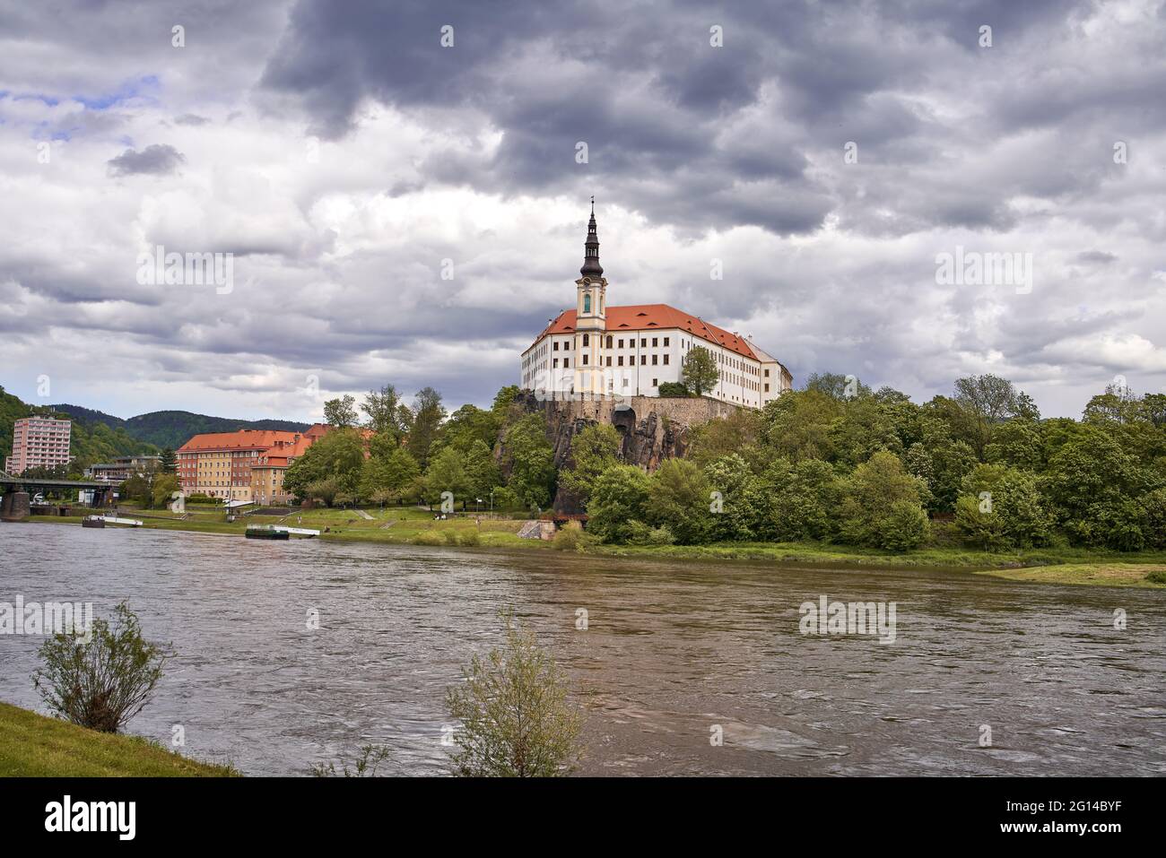 DECIN, CZECH REPUBLIC - MAY 22, 2021: Panorama of the town with the castle behind the Elbe river Stock Photo