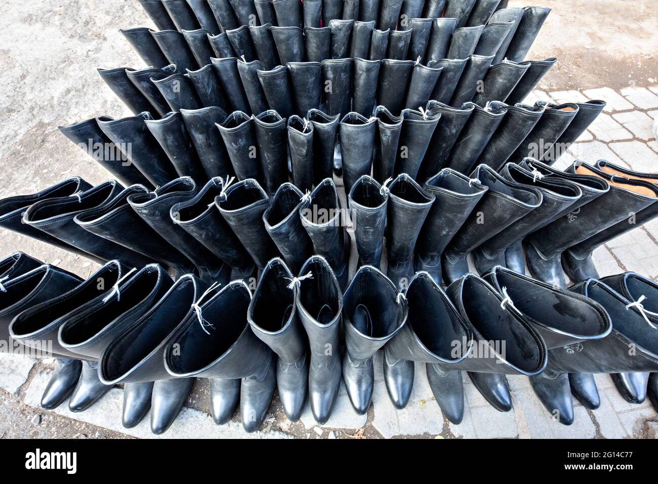 Group of woman boots in the market. Stock Photo