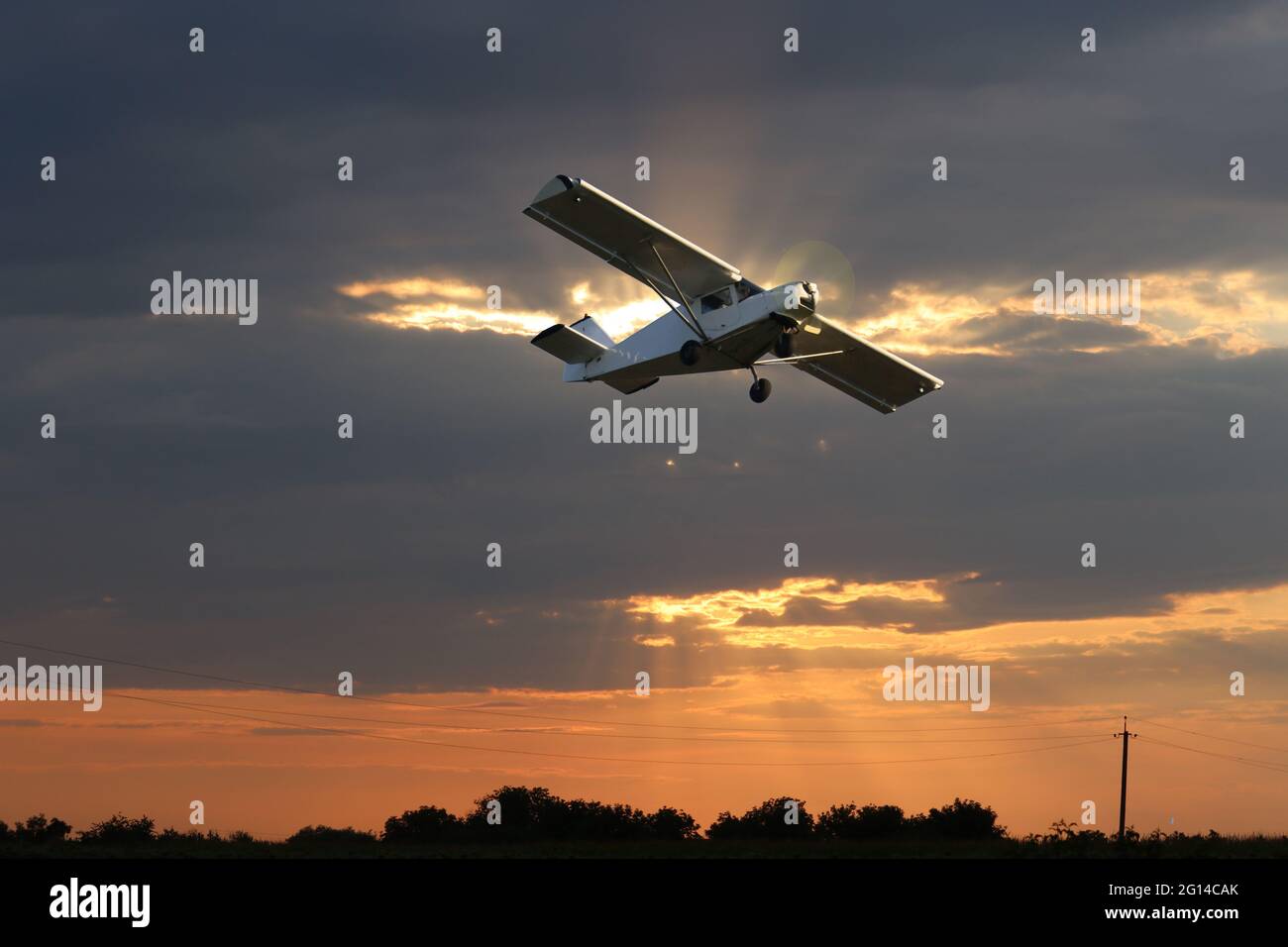 Private singlepropeller plane against the dramatic sky digital