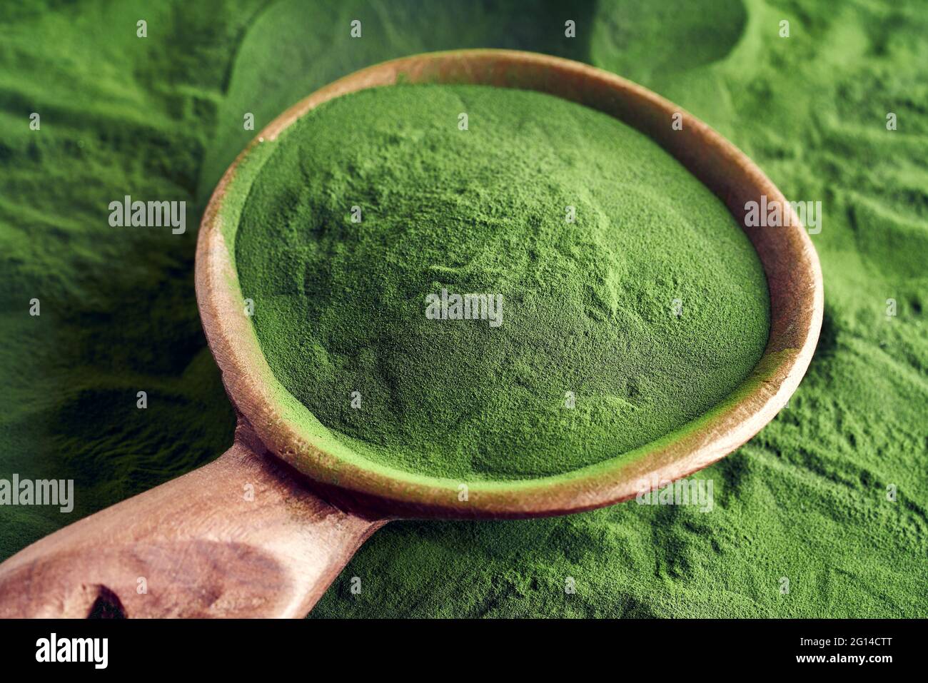 Ground chlorella algae on a spoon Stock Photo Alamy