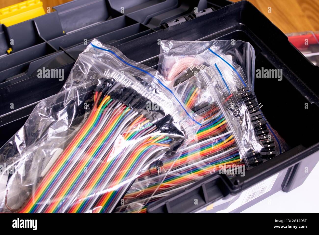 Colored wires in bags in a box close up Stock Photo