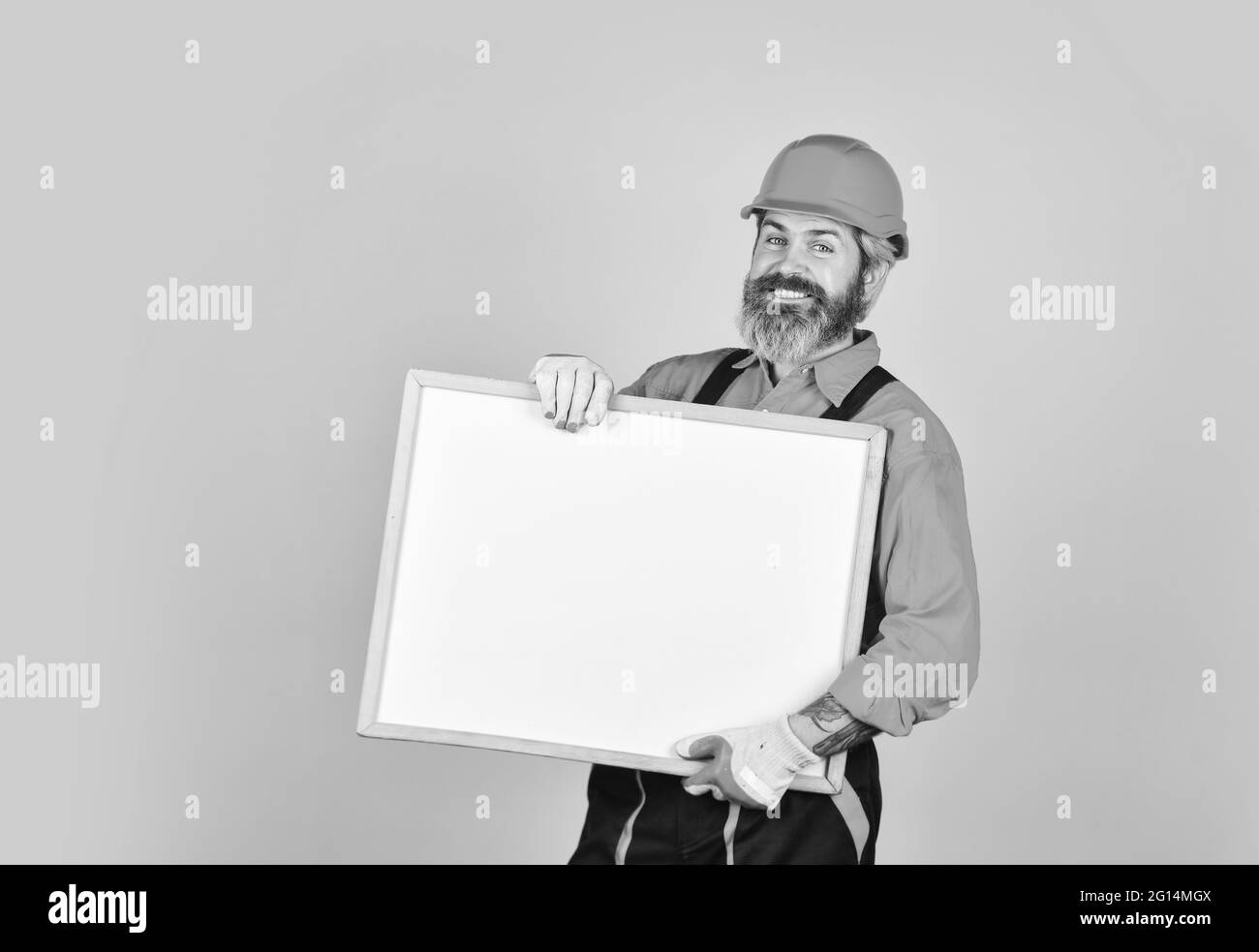 Troubleshoot concept. Repairman hold whiteboard copy space. Handsome