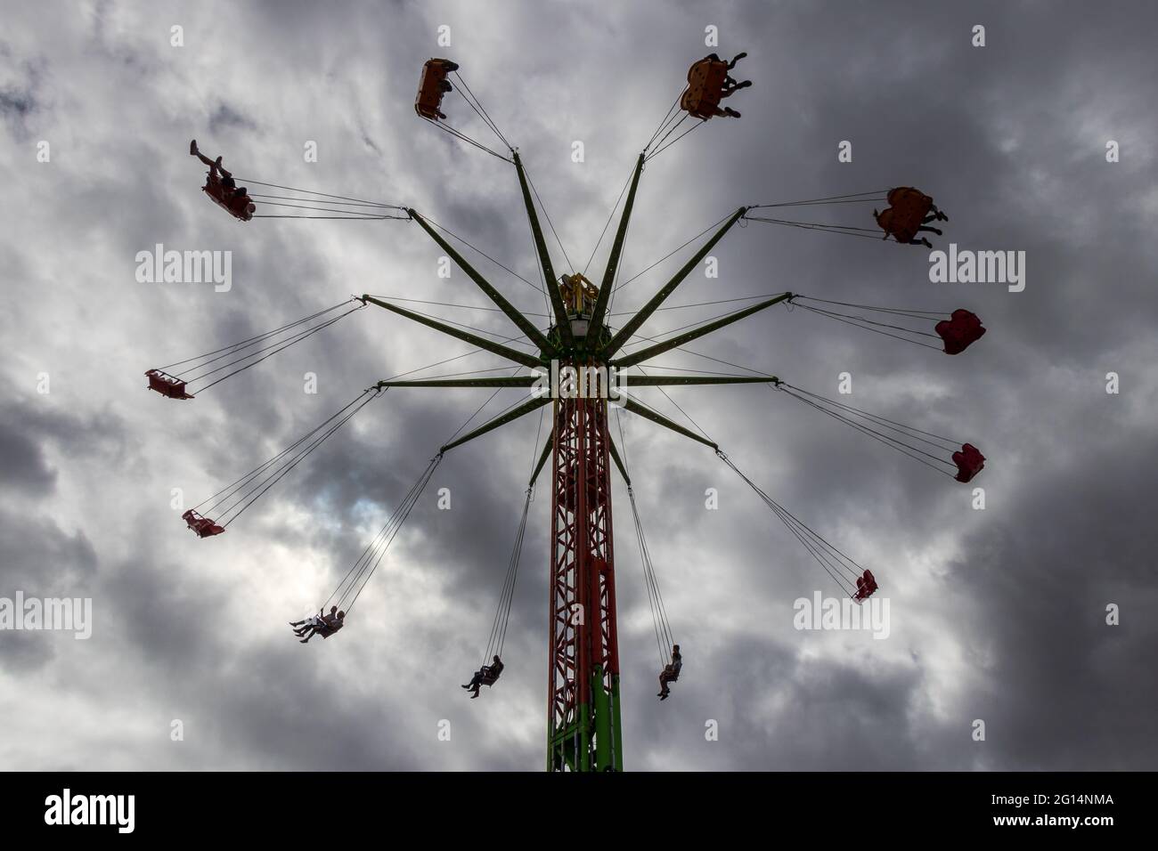 Fun fair swing ride spinning Stock Photo