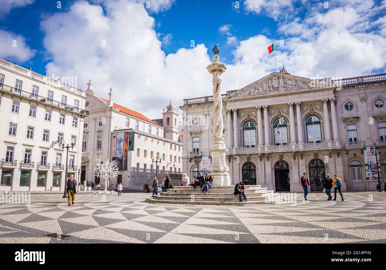 LISBON, PORTUGAL - MARCH 25, 2017: Municipal Square with mosaic pavement and Pillory of Lisbon, Portugal Stock Photo
