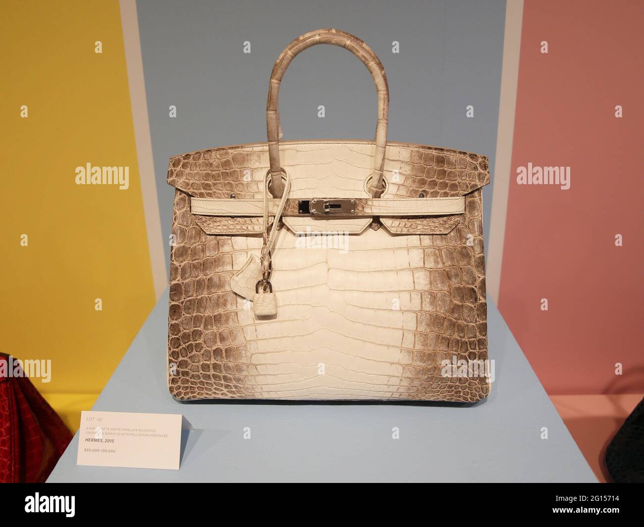 New York, USA. 04th June, 2021. A rare, 2015 Hermes matte white himalaya  niloticus crocodile birkin 35 with palladium hardware is on display along  with other handbags & accessories when Christie's unveils