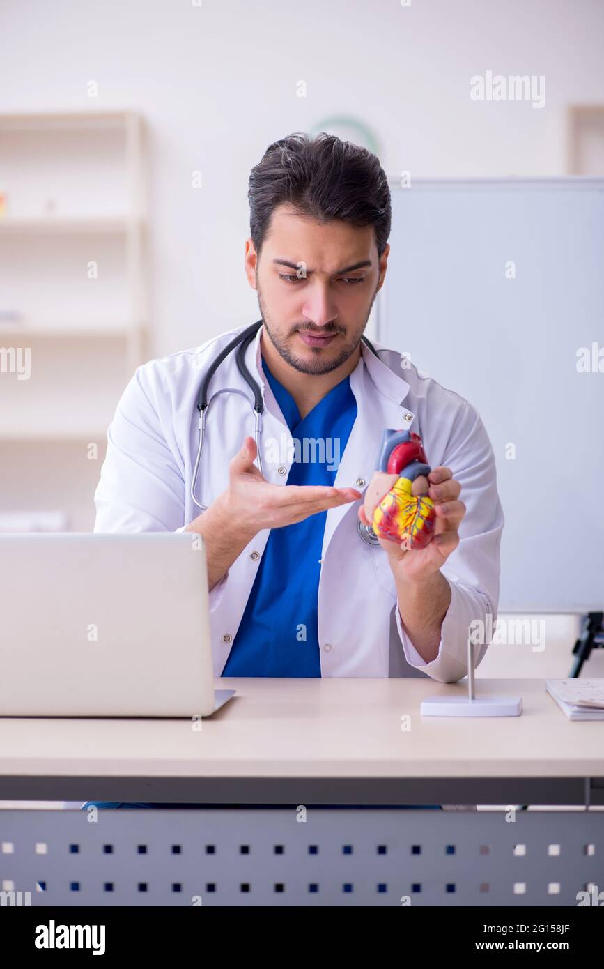 Young doctor cardiologist in the classroom Stock Photo Alamy