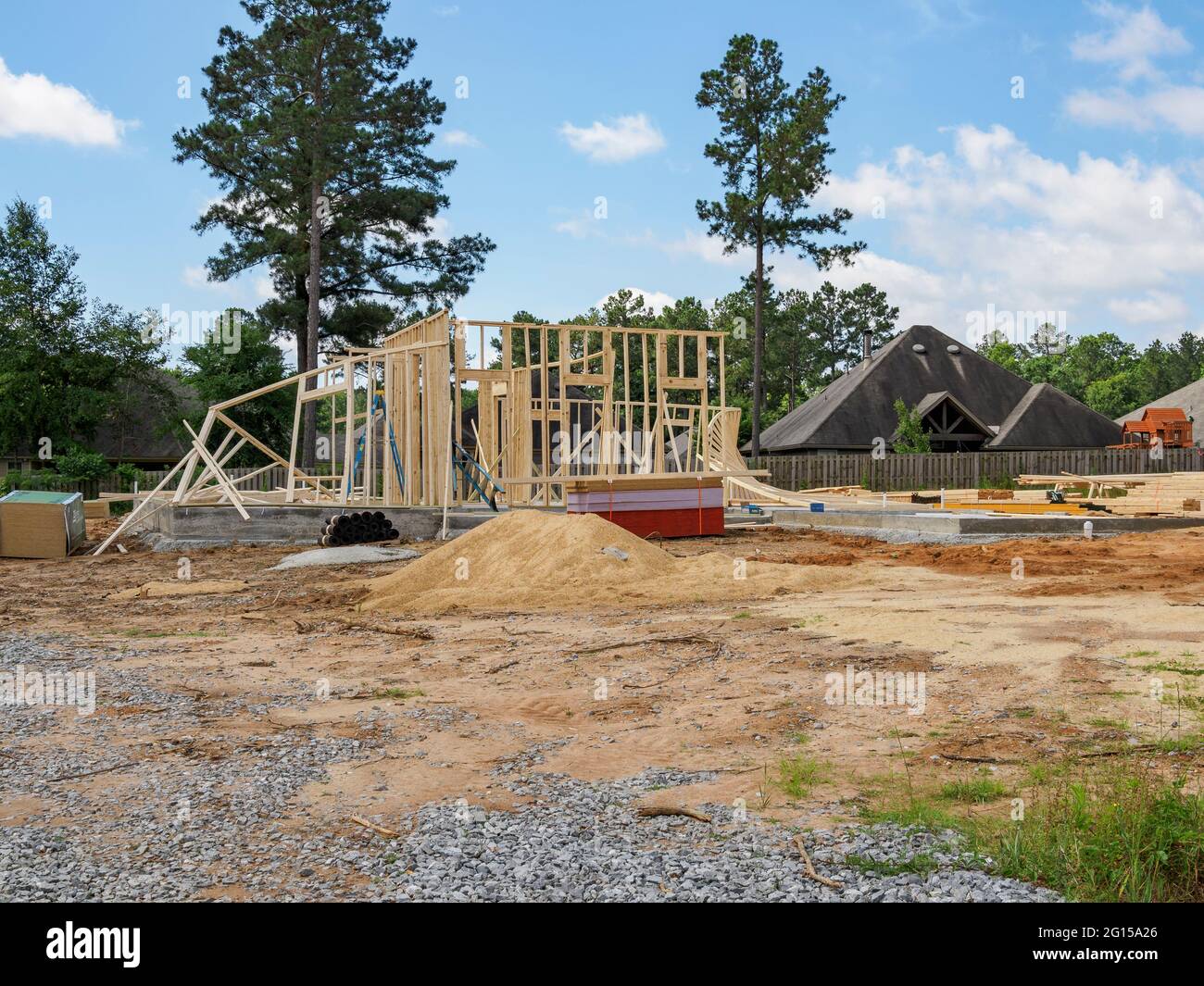 Storm and wind damaged new home construction with collapsed framed walls in Pike Road Alabama, USA. Stock Photo