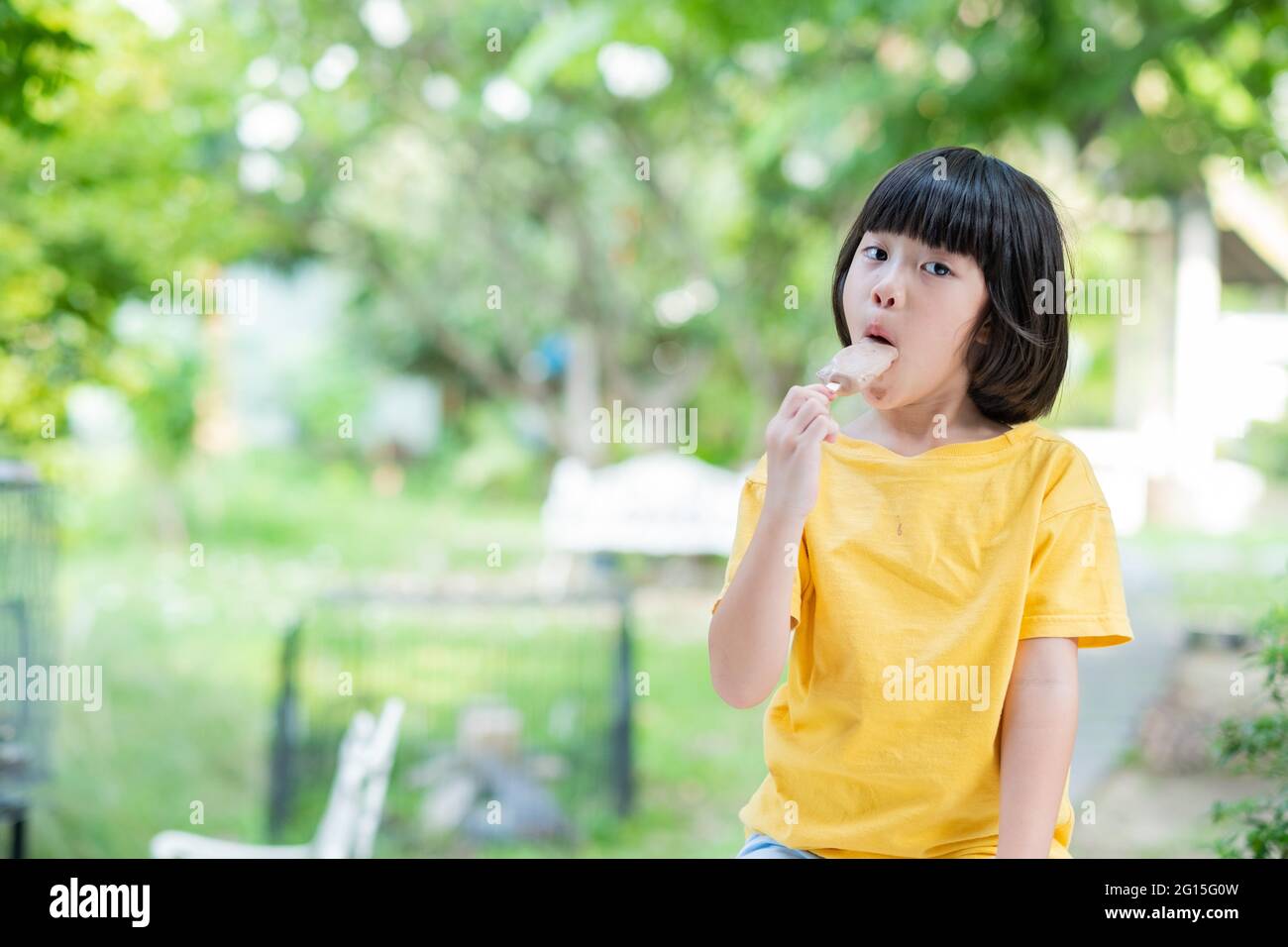 kid eating ice cream, delicious and happy concept Stock Photo Alamy