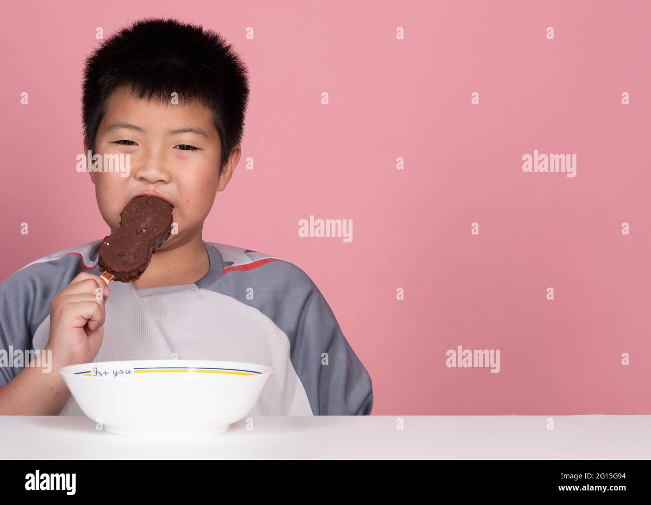 kid eating ice cream, delicious and happy concept Stock Photo Alamy