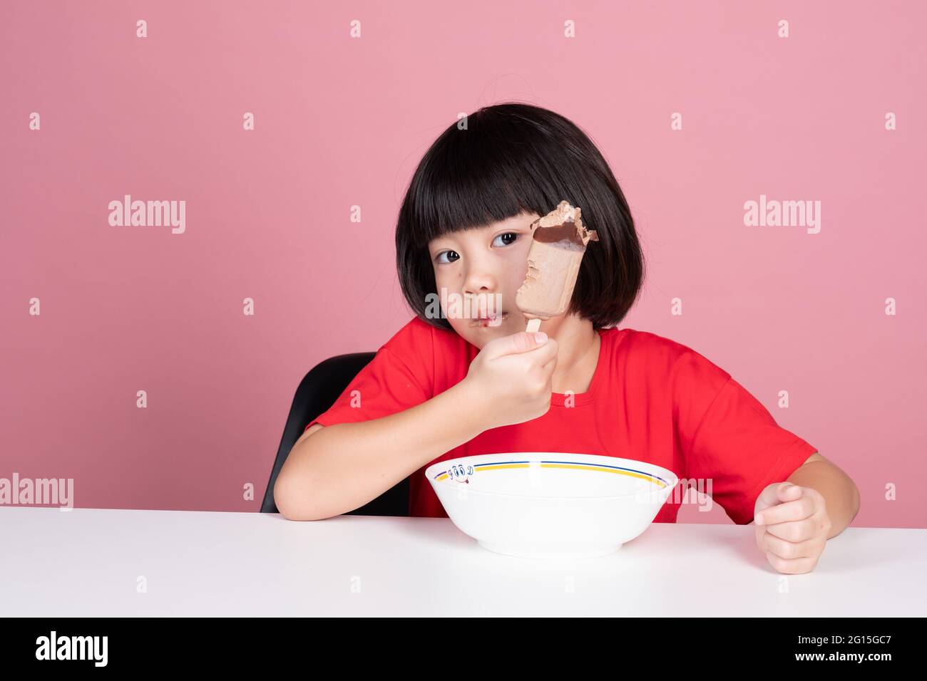 asian kid eating ice cream, summer season Stock Photo Alamy