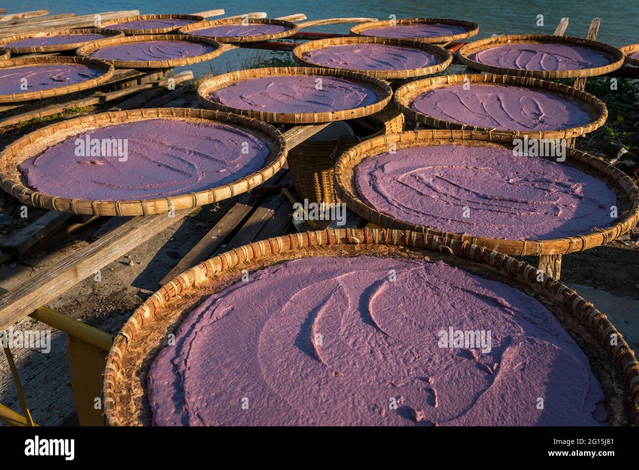 Shrimp paste drying in rattan trays, Tao O, Lantau Island, Hong Kong Stock Photo