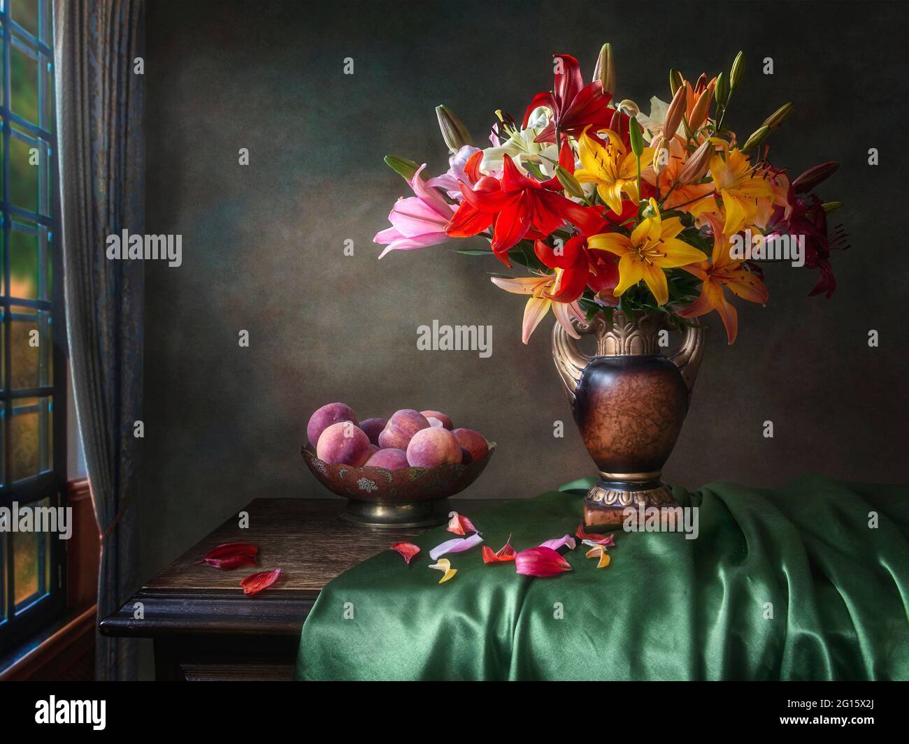 Still life with beautiful bouquet of garden lily and fruits Stock Photo ...