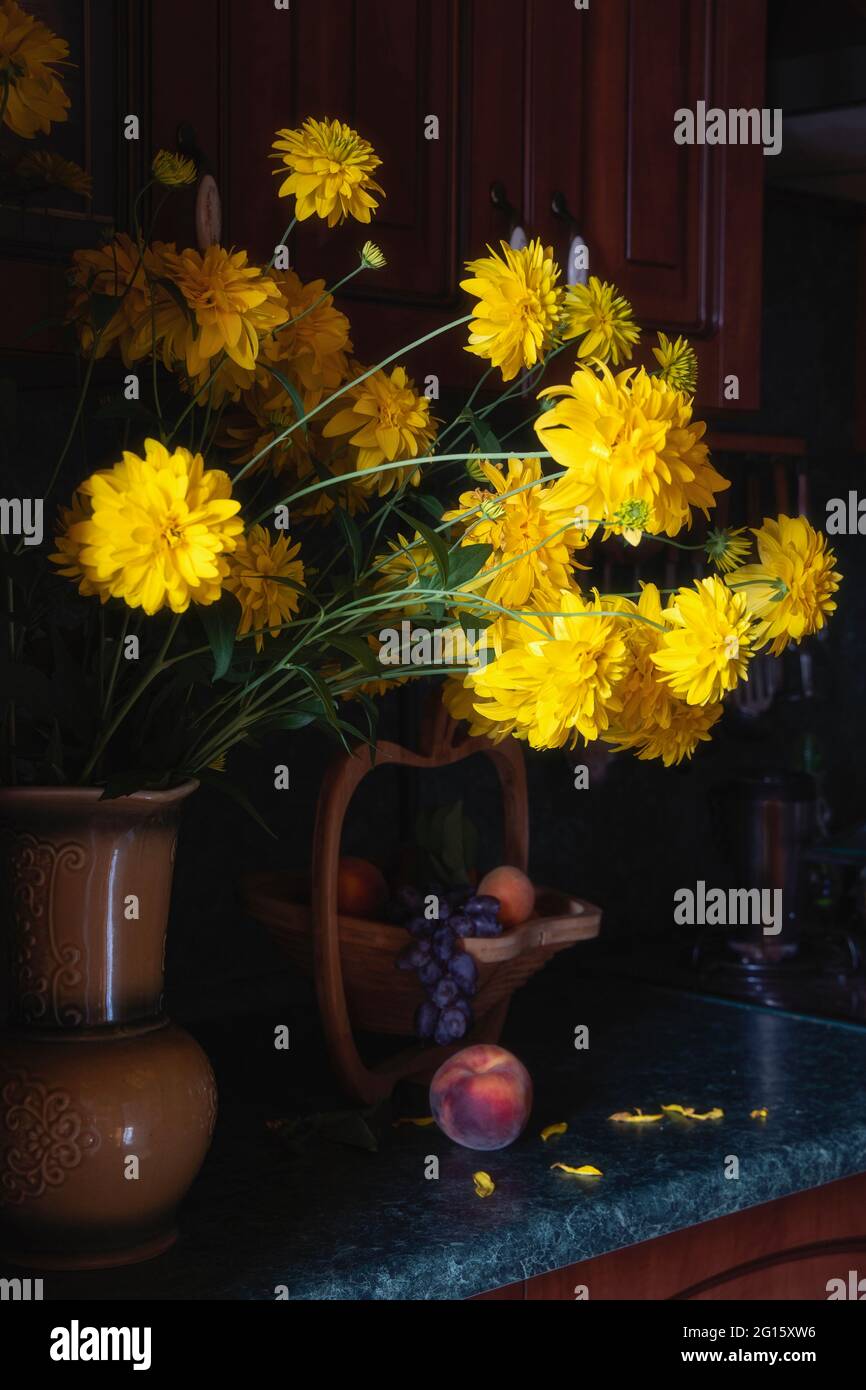 Still life with beautiful bouquet of flowers and fruits Stock Photo - Alamy